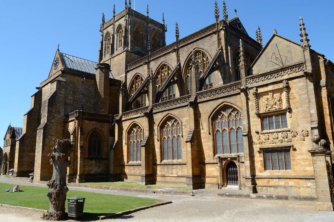 Sherborne Abbey is a grand Norman style church with a few remaining Saxon features.