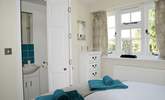 A folding door leads from the bedroom to the shower-room. - Thumbnail Image