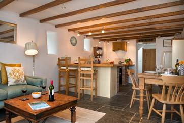 The delightful open plan living-room.