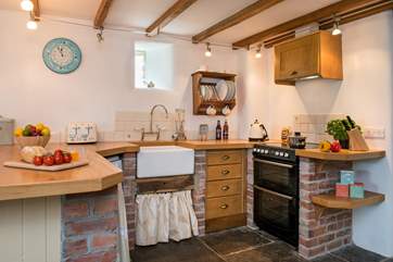 The kitchen-area has a lovely country feel about it.