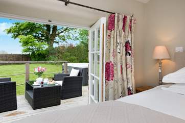 The double doors from the second bedroom lead out to the patio-area.