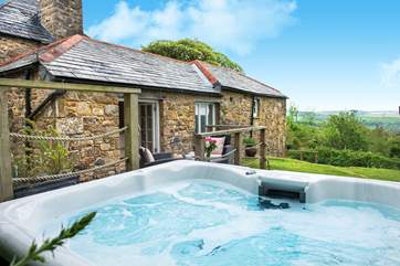 As you relax in the hot tub, you can enjoy the wonderful views across the valley.