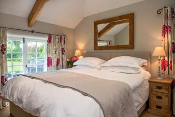 Bedroom 2 is delightful and has 'zip and link' beds, giving the flexibility to be either a double bed or twins.