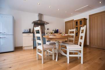 Chunky wooden furniture suits the eco-build cottage.