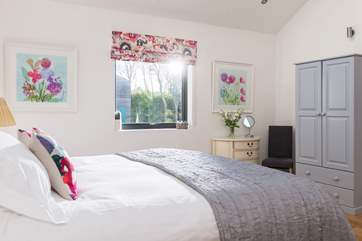 Relaxing shades of pale grey are complemented with splashes of gorgeous bright colours.