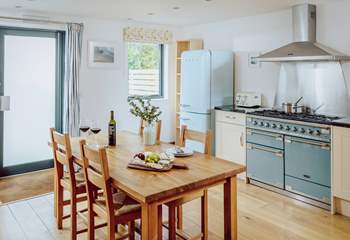 Chunky wooden furniture suits the eco-build cottage.