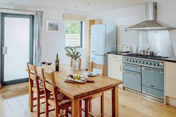 Chunky wooden furniture suits the eco-build cottage.