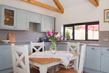The kitchen/dining-area in the open plan living-room.