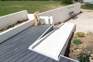There are steps up to the cottage at the front and a sloping ramp at the rear for easy access if mobility is limited.
