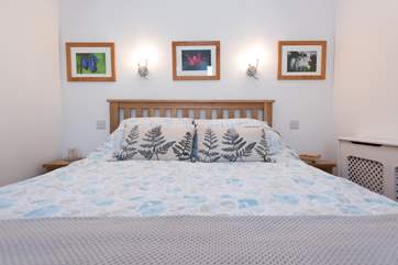 There is a king-size bed.