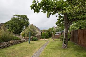 The gently sloping garden catches the sun all day.