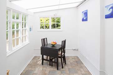 The garden-room provides a really useful extra area with washing machine and tumble-dryer.