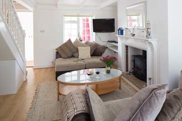 There is a wood-burner effect gas fire to cosy up to on a chilly night.