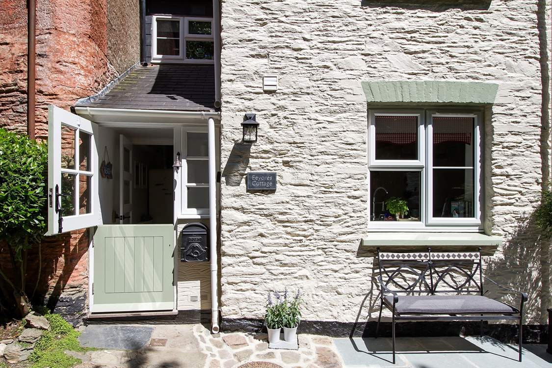 A stable-door leads into the porch.