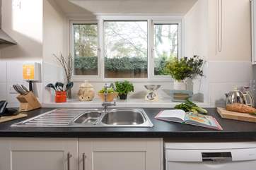 The kitchen looks out over the courtyard.
