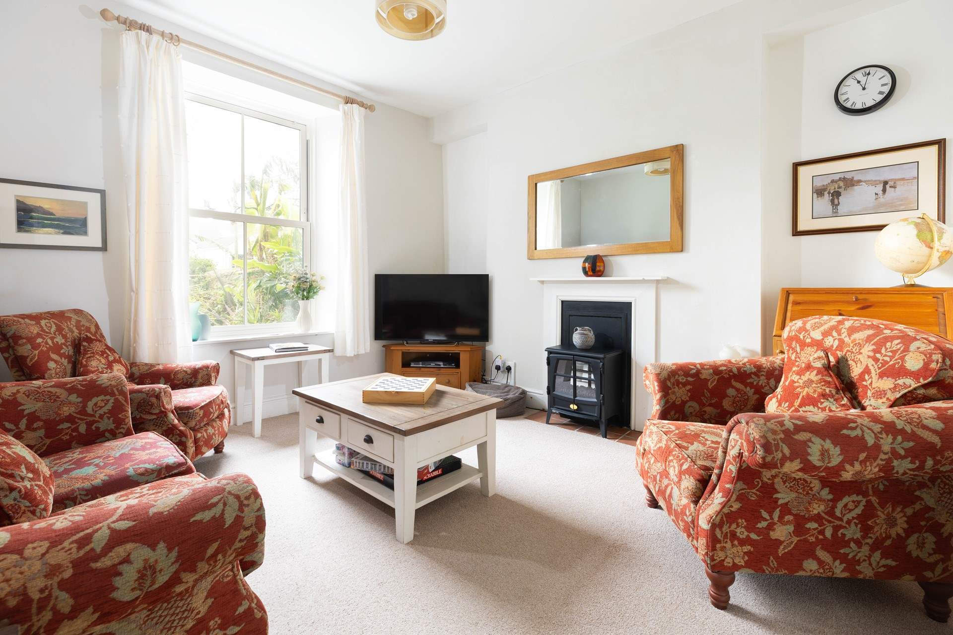 The sitting-room has an electric wood-burner effect stove.