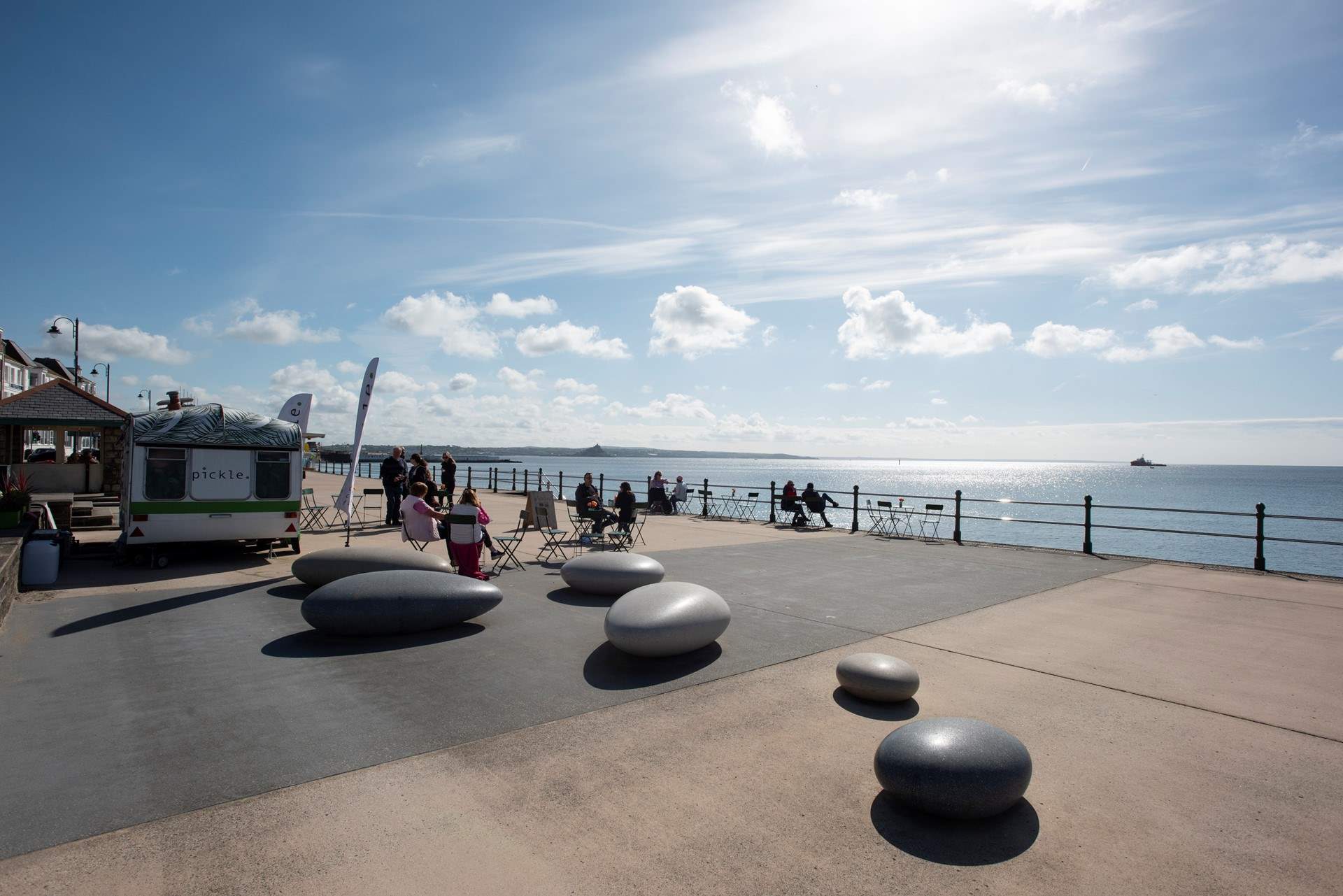 Soak up the sun walking along the promenade in Penzance.