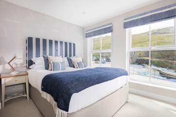 This gorgeous bedroom with super-king size bed is flooded with light.