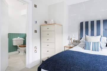 This lovely bedroom has an en suite shower-room.
