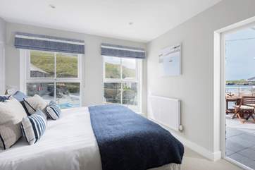 The master bedroom has a door directly onto the balcony.