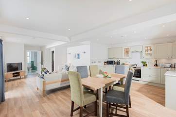 All the bedrooms are located off the central living-room, a great space for relaxing with family and friends.