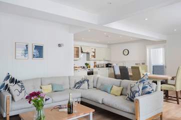 This light contemporary interior has been beautifully designed and furnished with quality and comfort in mind.