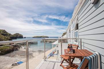 Sit a while on your private balcony with a chilled bottle of a local brew.
