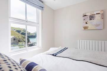 This bedroom has a rather good view without leaving the comfort of the crisp cotton sheets.
