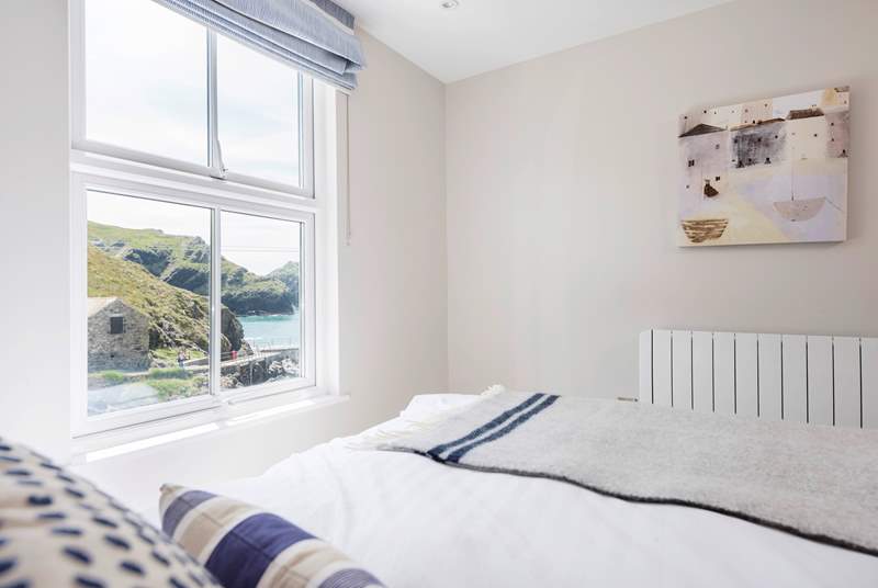 This bedroom has a rather good view without leaving the comfort of the crisp cotton sheets.