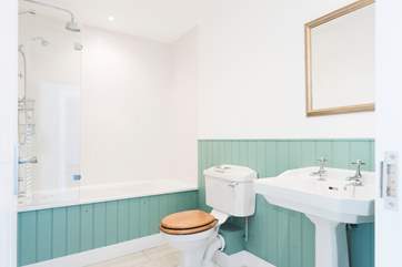 The bathroom is tastefully decorated.