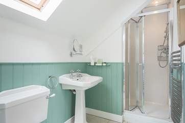 The en suite shower-room complete with a large shower rose and separate attachment to wash off the salt and sand after a day at the beach.