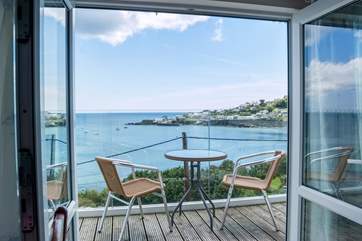 Step out on the balcony to enjoy those wonderful views from this rooftop apartment.
