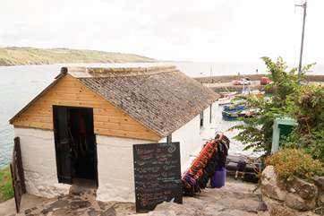 The windsurfing school where you can hire a kayak, paddleboard/SUP or take a windsurfing lesson (April to September).