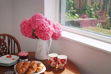 Breakfast is served in the kitchen with a view over the small area of grass to the front, a good spot to sit and watch the view but take care with young children in the sloped garden.