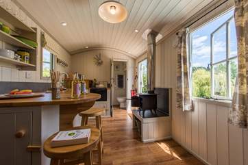 Looking through the hut from the double bed. The en suite shower-room is at the far end.