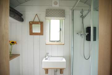 At one end is the beautifully fitted shower-room.