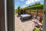 Sheltered and secluded, relax in the hot tub and make the most of the countryside views.