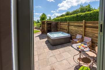 Sheltered and secluded, relax in the hot tub and make the most of the countryside views.