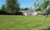 This is the edge of village setting. The owners' farmhouse is set back from the cottage and so you will have plenty of privacy. The village has a CAMRA pub and a wonderful village shop/cafe. - Thumbnail Image