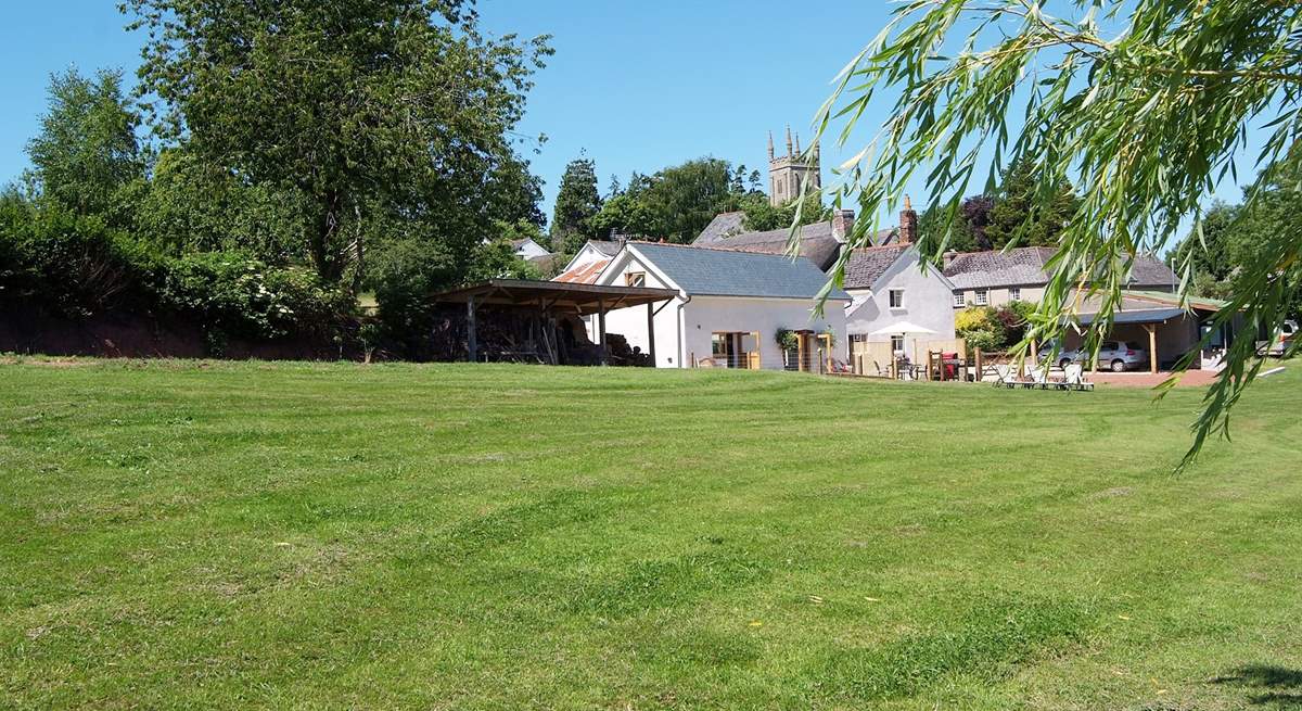 This is the edge of village setting. The owners' farmhouse is set back from the cottage and so you will have plenty of privacy. The village has a CAMRA pub and a wonderful village shop/cafe.