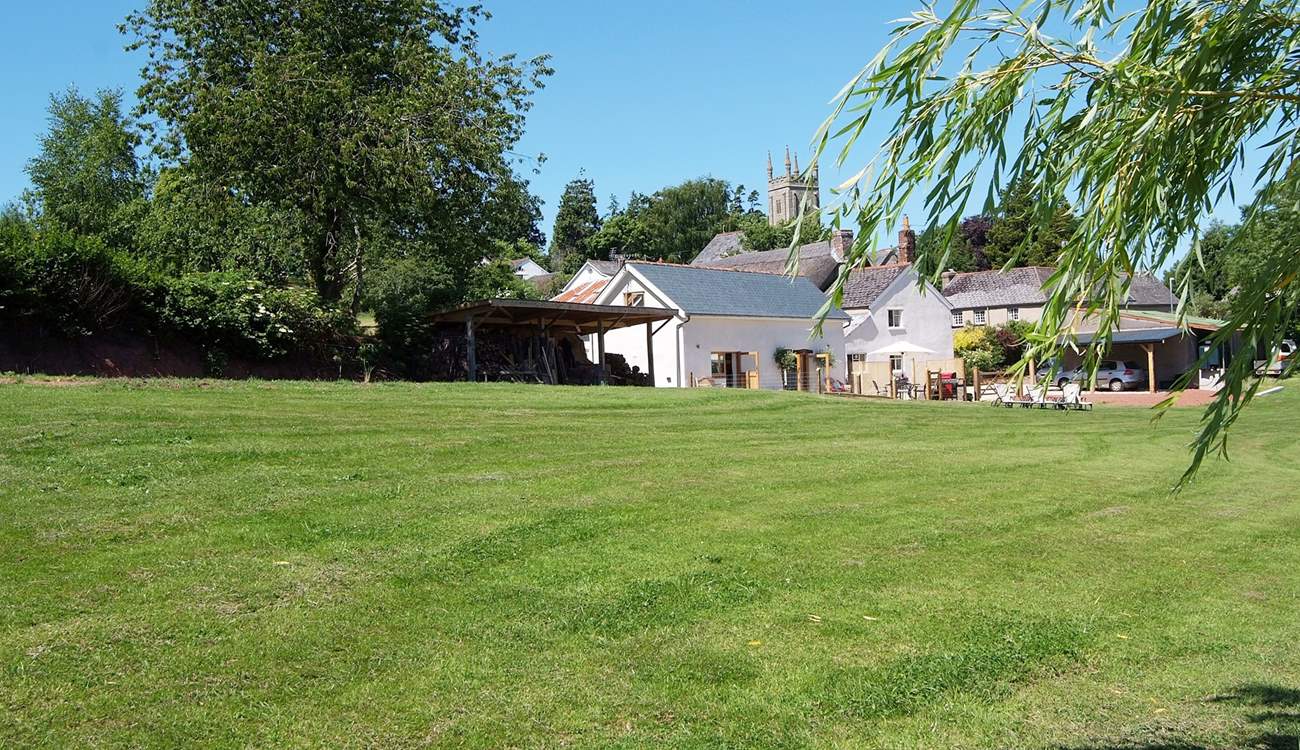 This is the edge of village setting. The owners' farmhouse is set back from the cottage and so you will have plenty of privacy. The village has a CAMRA pub and a wonderful village shop/cafe.