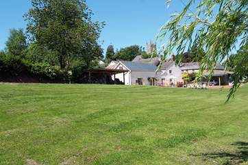 This is the edge of village setting. The owners' farmhouse is set back from the cottage and so you will have plenty of privacy. The village has a CAMRA pub and a wonderful village shop/cafe.