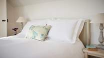 Luxurious soft furnishings and bedding add to the experience here.