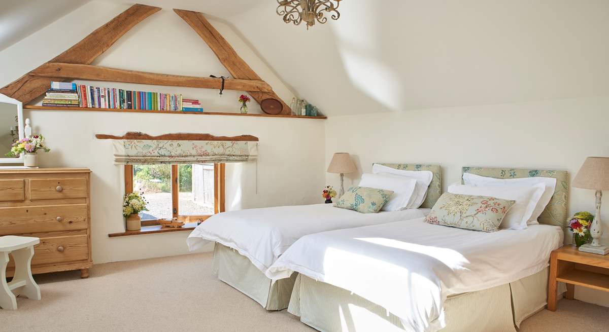 The option of twin beds adds flexibility to this wonderful home.