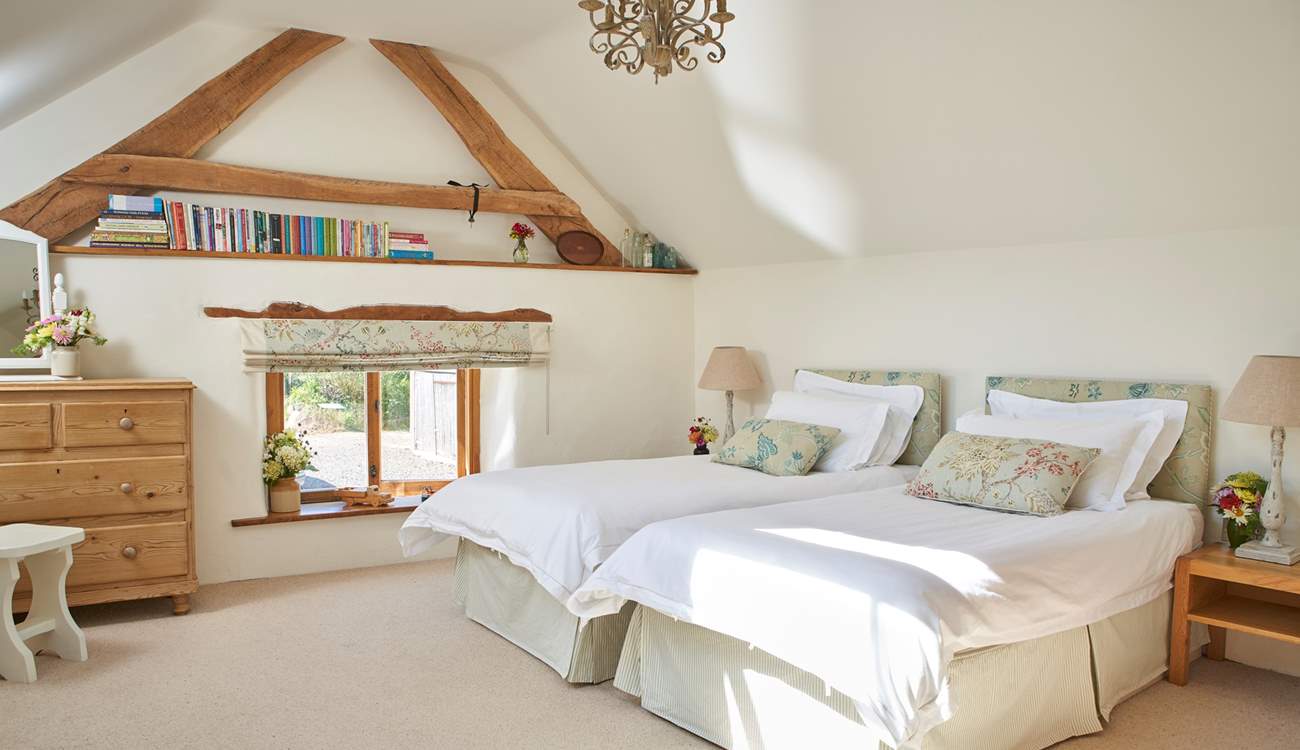 The option of twin beds adds flexibility to this wonderful home.