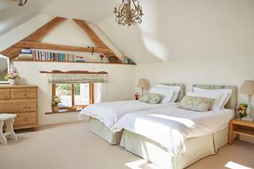 The option of twin beds adds flexibility to this wonderful home.