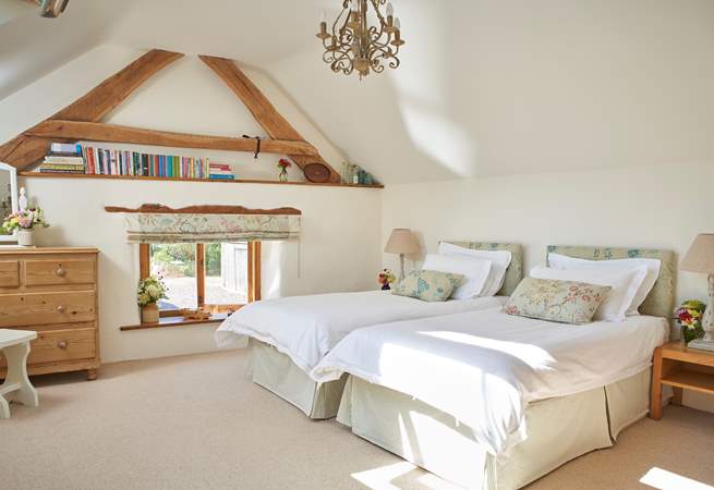 The option of twin beds adds flexibility to this wonderful home.
