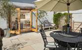 The living-room has fabulous French windows out onto the patio - with that great view beyond. - Thumbnail Image