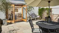 The living-room has fabulous French windows out onto the patio - with that great view beyond.