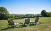 This wonderful space is all for you. The meadow spreads out directly in front of the cottage - there is even a hammock at the far end. - Thumbnail Image